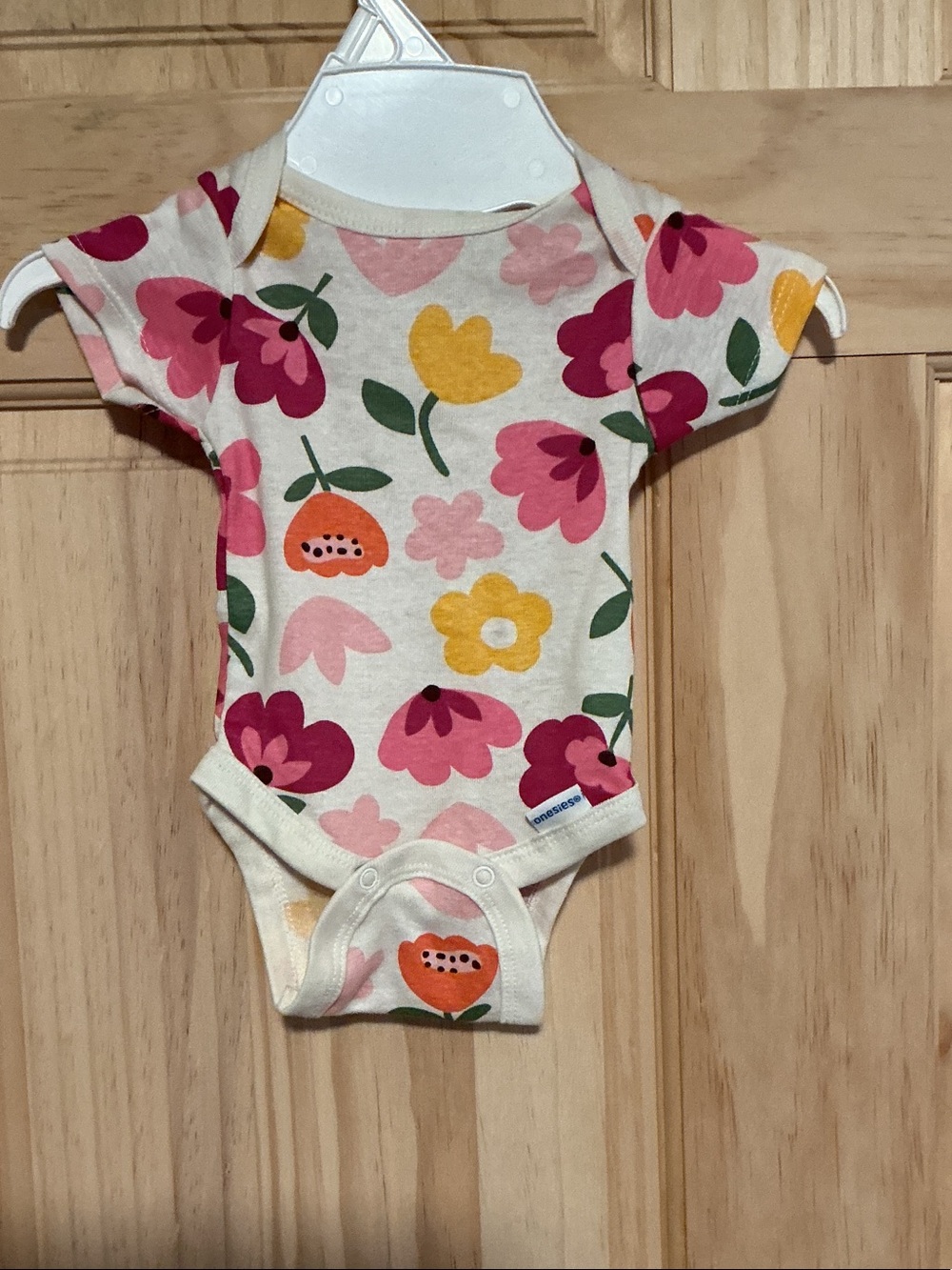 Floral Cotton Baby One-Piece Bodysuit in Cream with Pink & Yellow Flowers